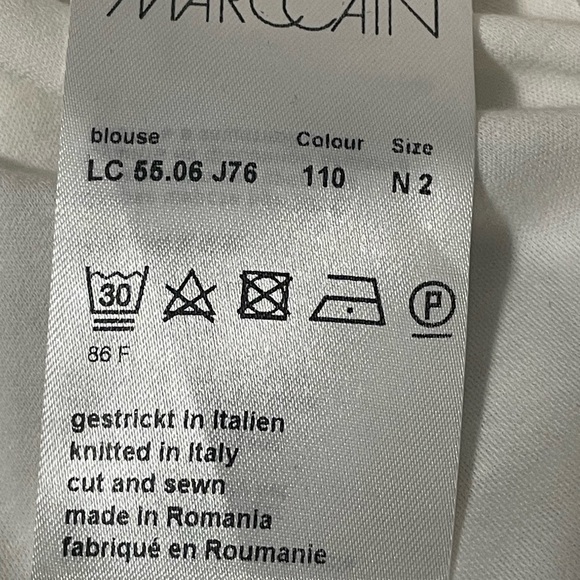 Marc Cain ivory feminine ruffle v neck blouse. Cap sleeve with ruffle. Very soft - Picture 9 of 10